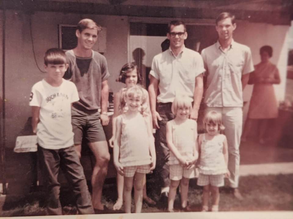 Back row: Tom, Linda, Bill and Curt.  Front row Tony, Tami, Tanya, Tia.  Grandma Marie in the background